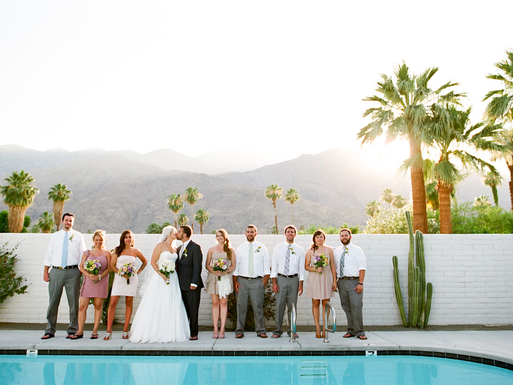 bridal party pose near pool during l'horizon palm springs wedding