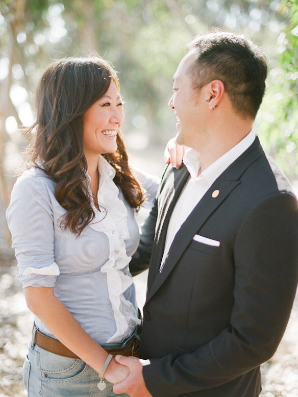 couple embracing and laughing la jolla elopement