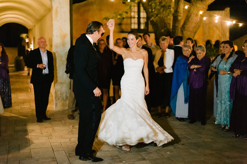 bride and groom dance in courtyard andretti winery wedding