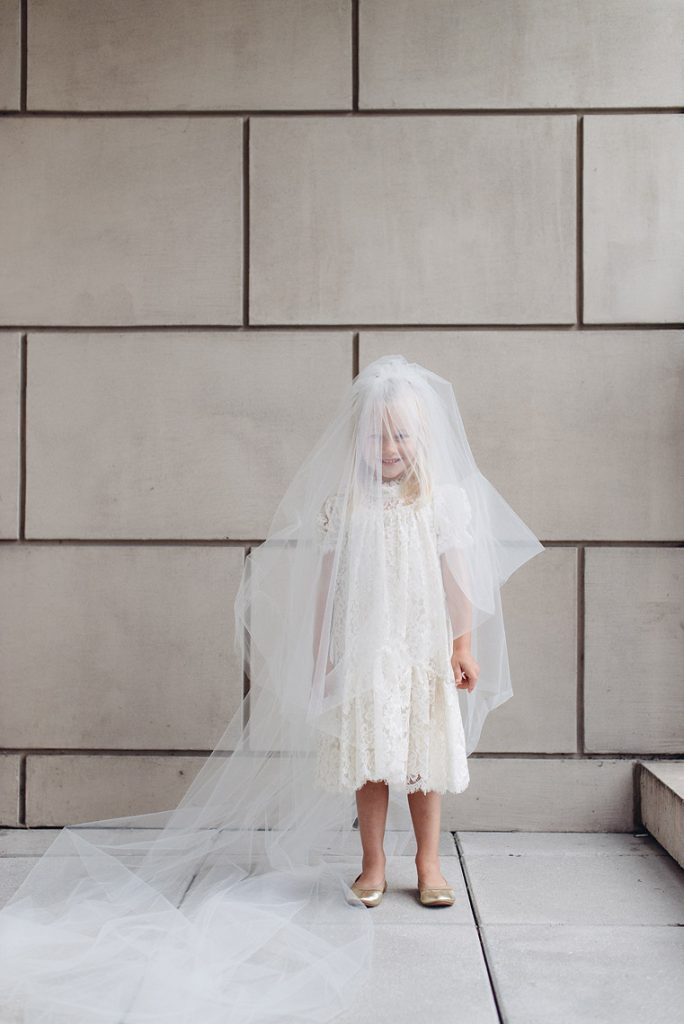 flower girl playing with veil waldorf astoria chicago