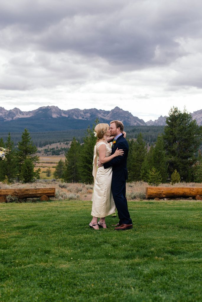 bride groom kiss idaho rocky mountain ranch sun valley destination wedding