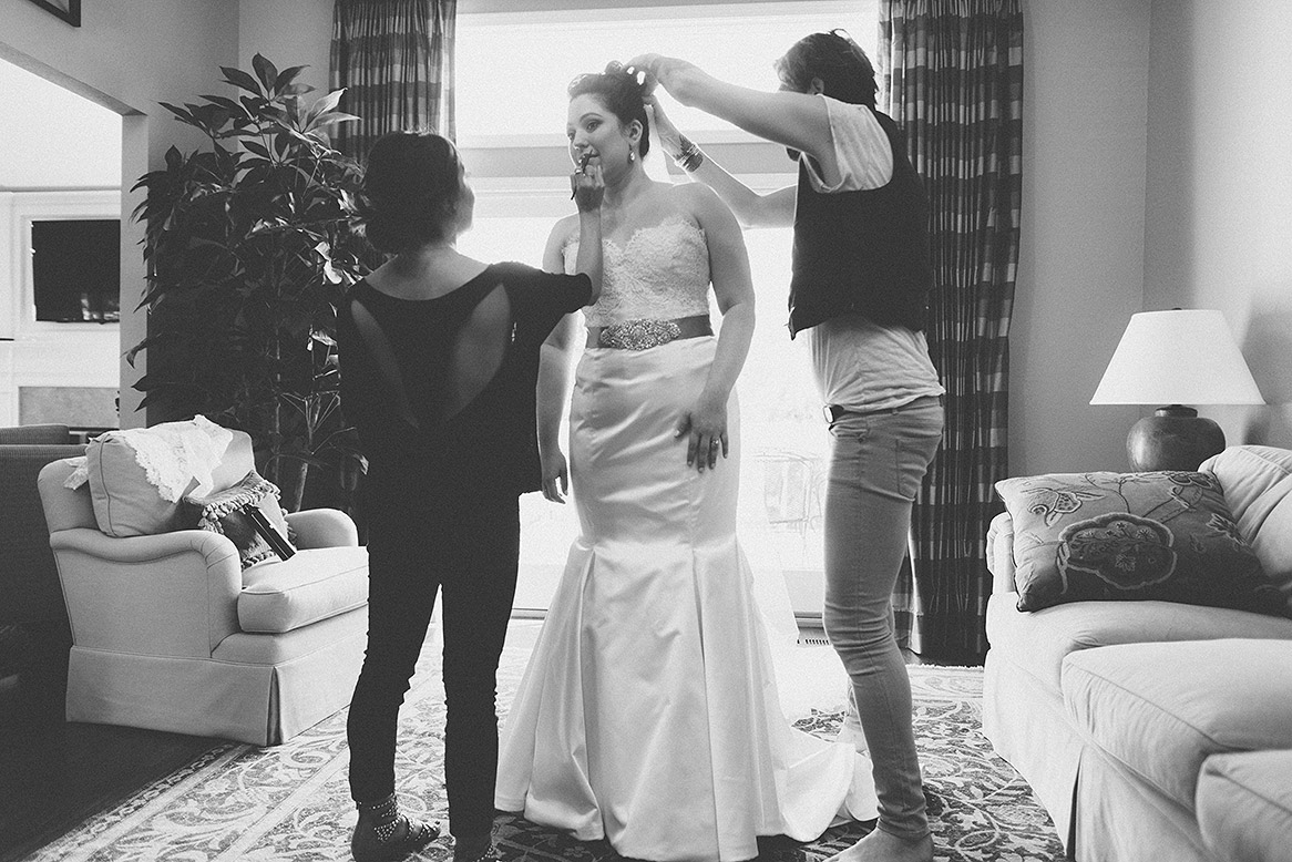 hair and makeup artists prepare bride for portola valley wedding