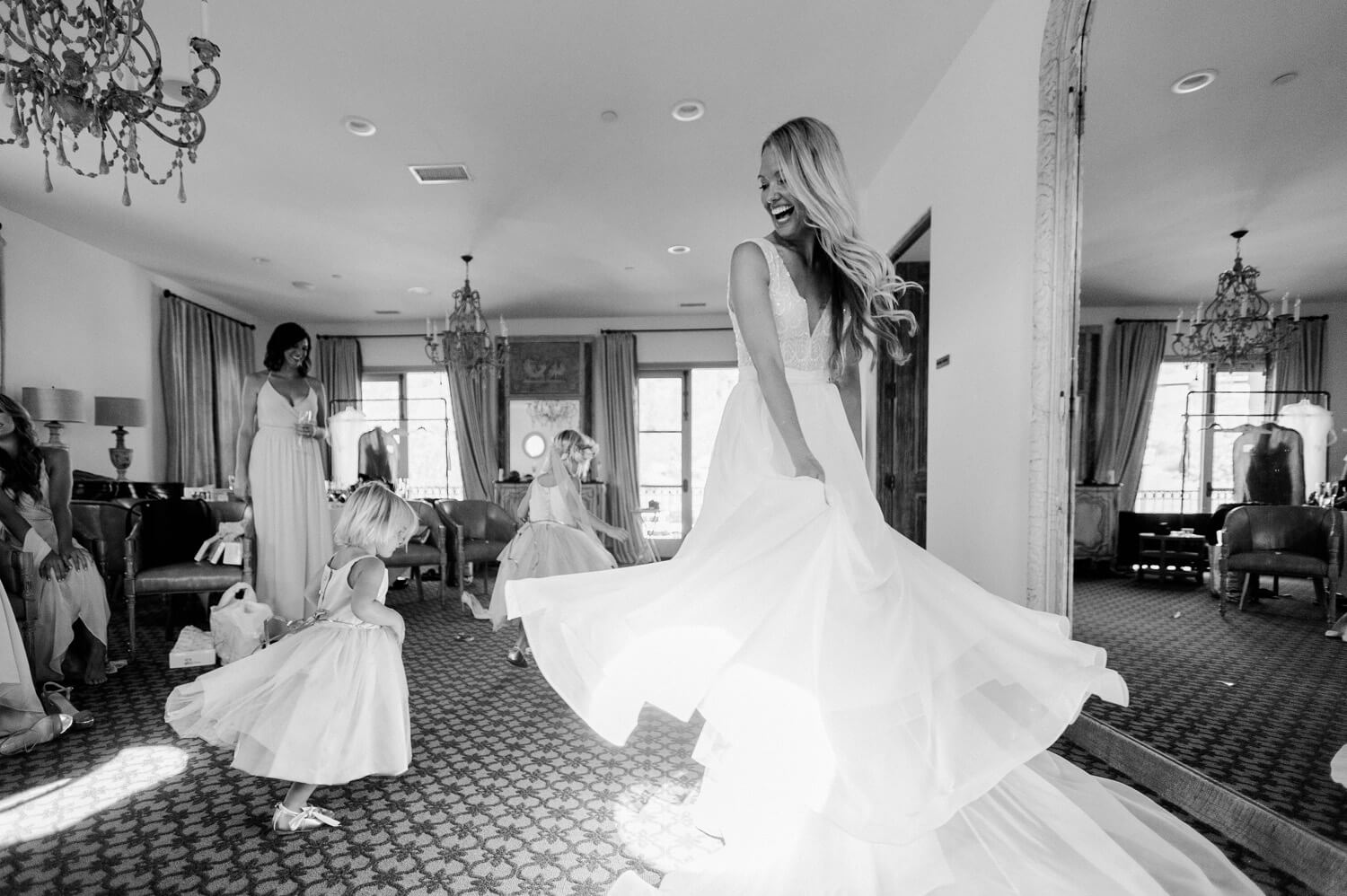 bride spinning before the havens country club wedding