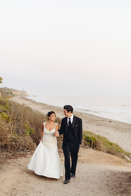 bride and groom walk beach path bacara wedding santa barbara