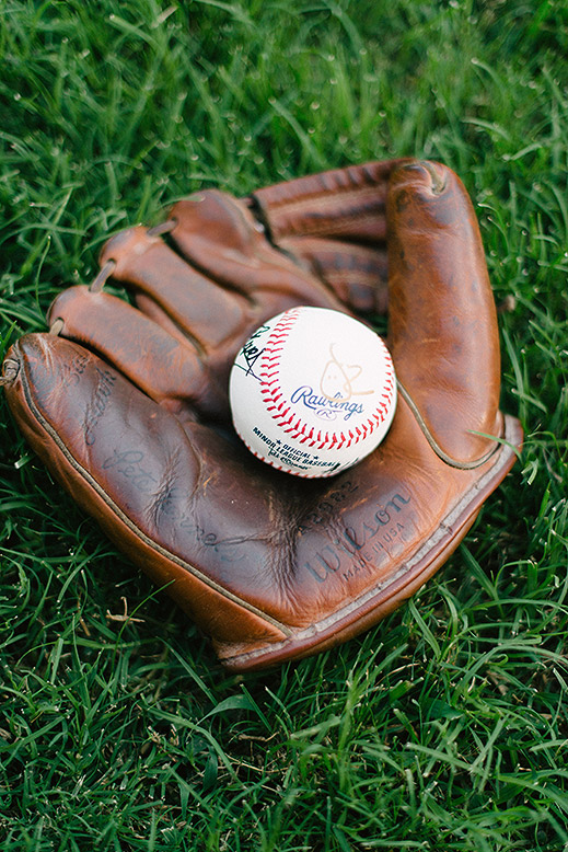 vintage baseball glove and ball at wedding reception