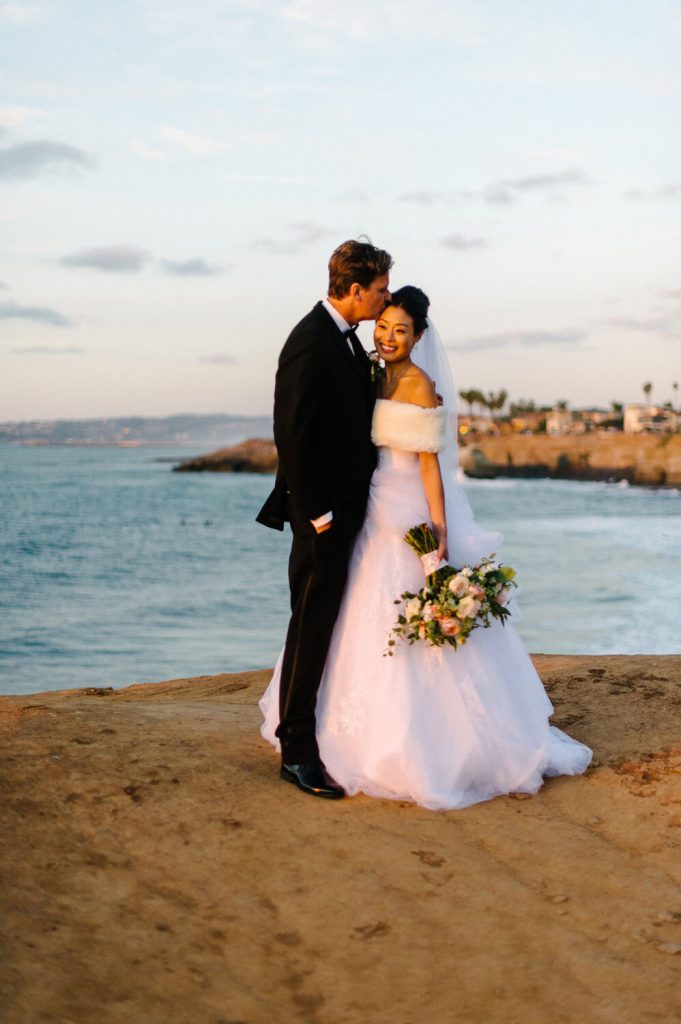 bride groom pose sunset cliffs intimate wedding ceremony