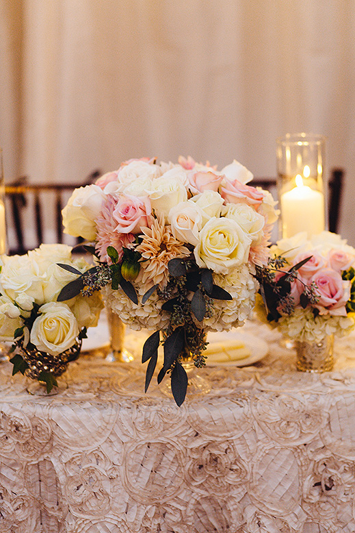 textured table linen yellow and pink roses with orange dahlias