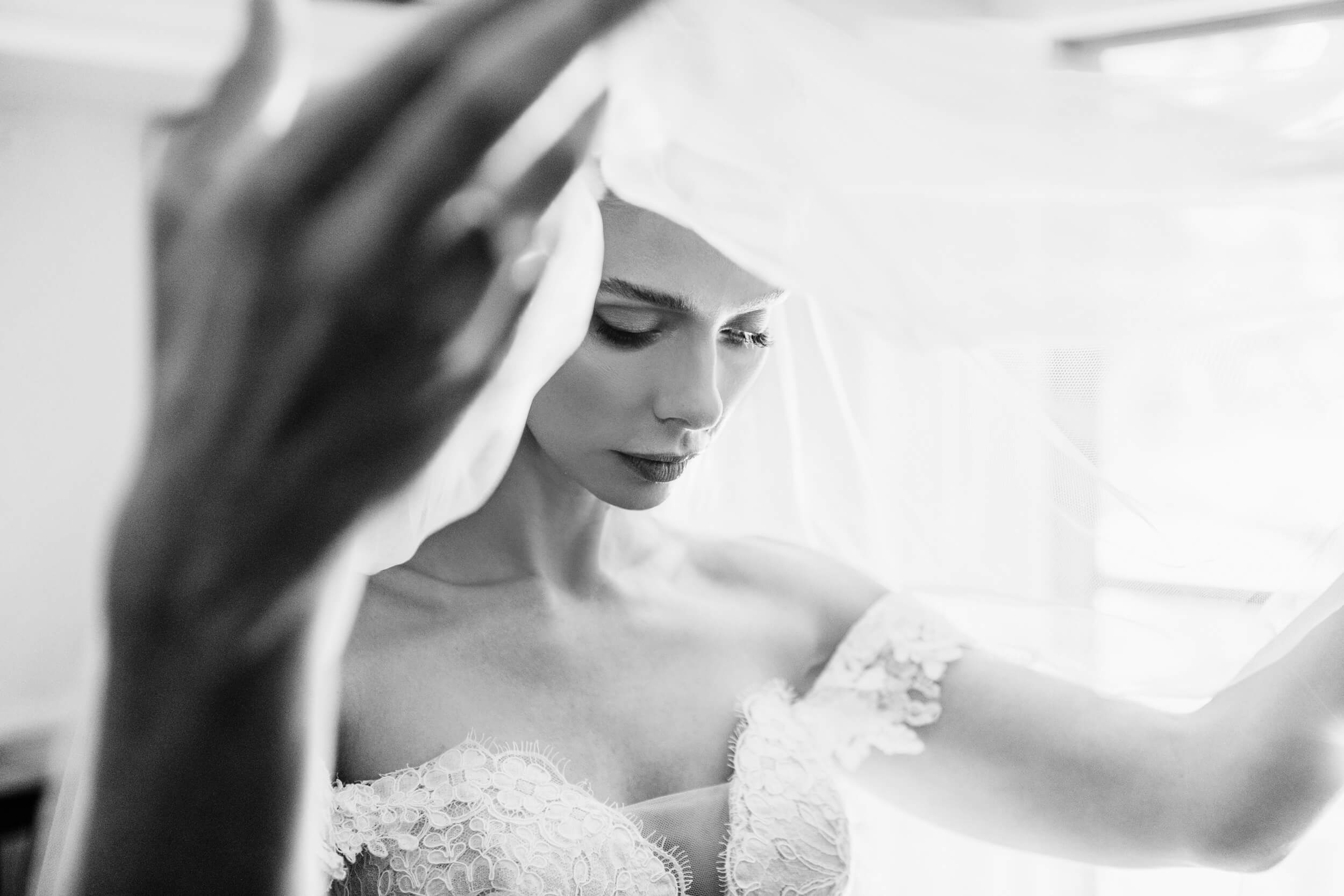 bride adjusting veil