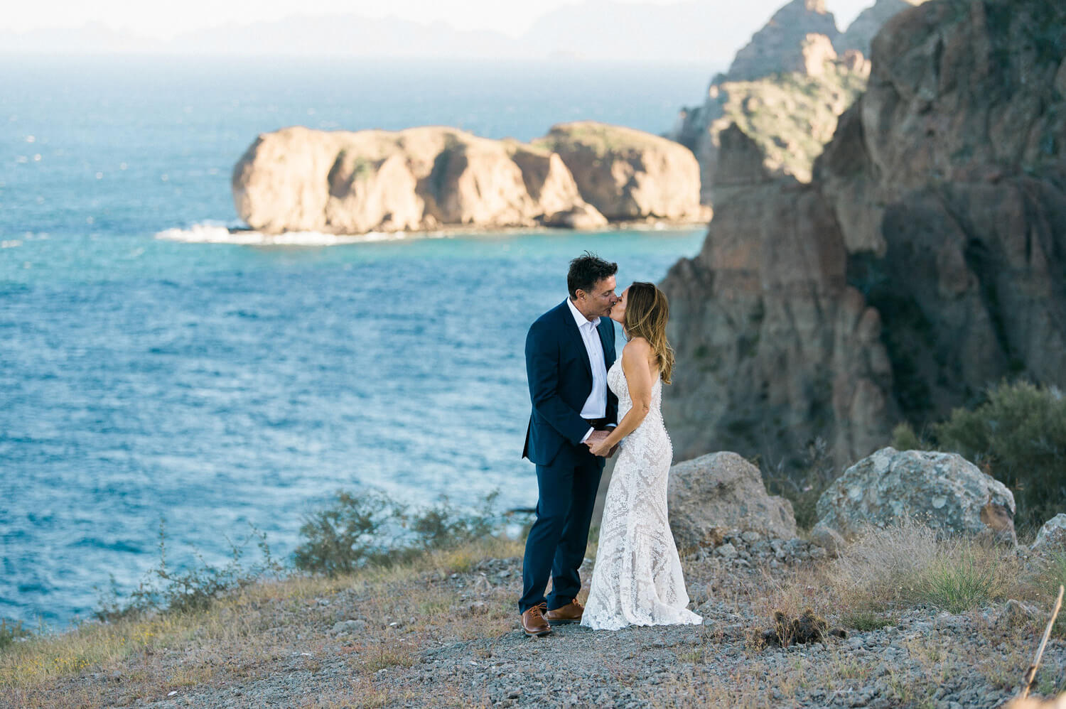 bride groom kiss near 17th hole villa del palmar sea of cortez islands