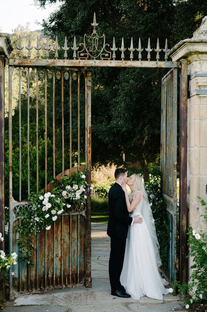bride groom kiss french gates vista valley country club