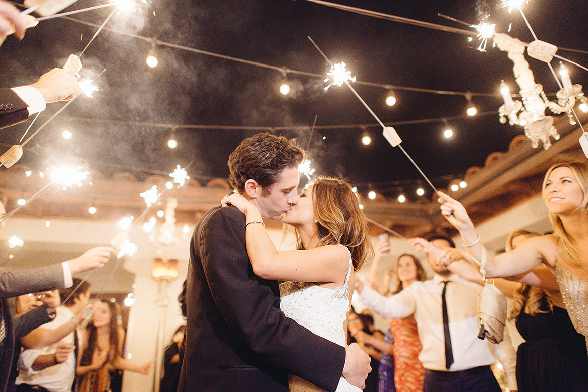 bride groom kiss sparkler exit bacara