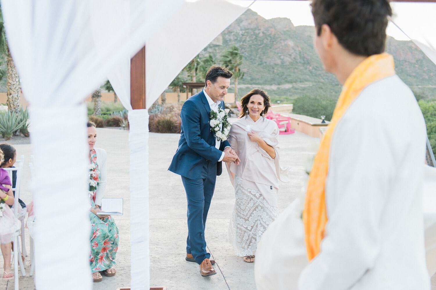 bride groom approach officiant villa del palmar wedding
