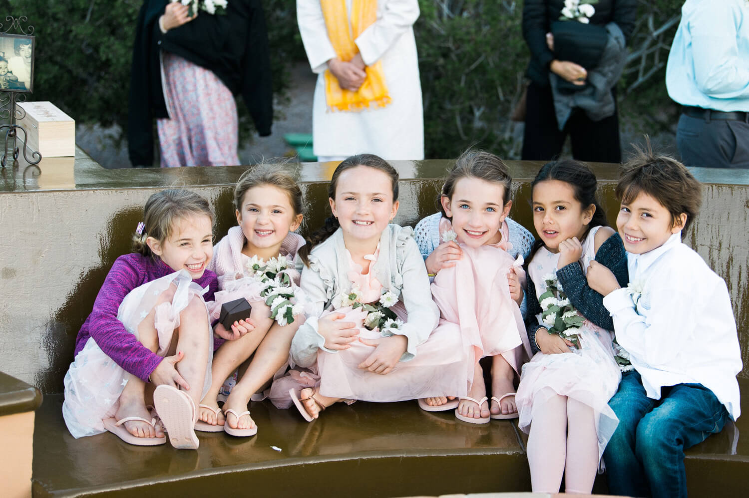 children huddle to stay warm villa del palmar wedding