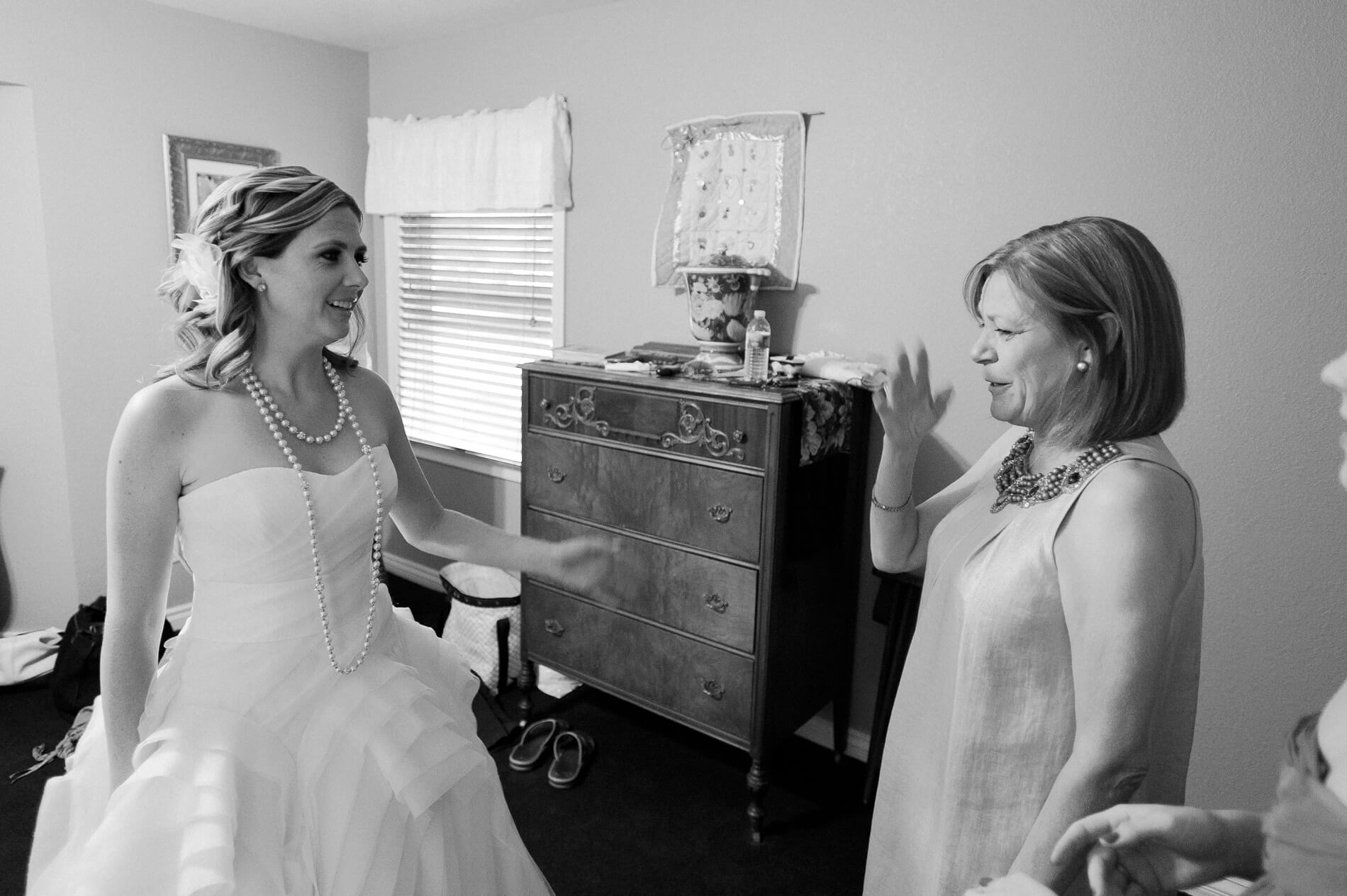 brides mother getting emotional looking at daughter