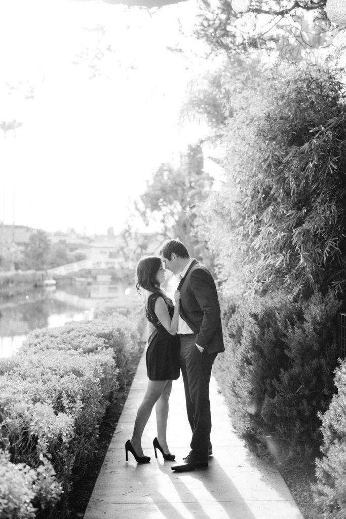 couple holding hands venice canals engagement photo
