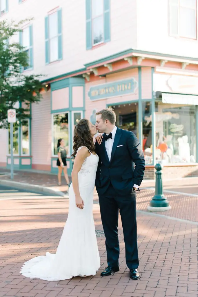 bride and groom kissing downtown cape may new jersey wedding