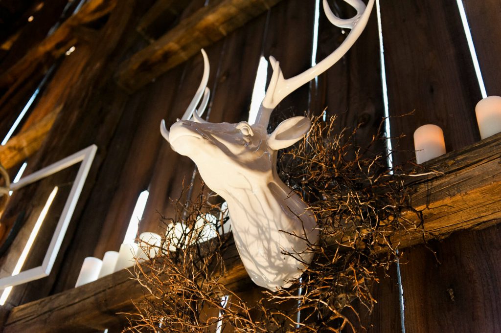 white plastic deer head rustic barn wedding