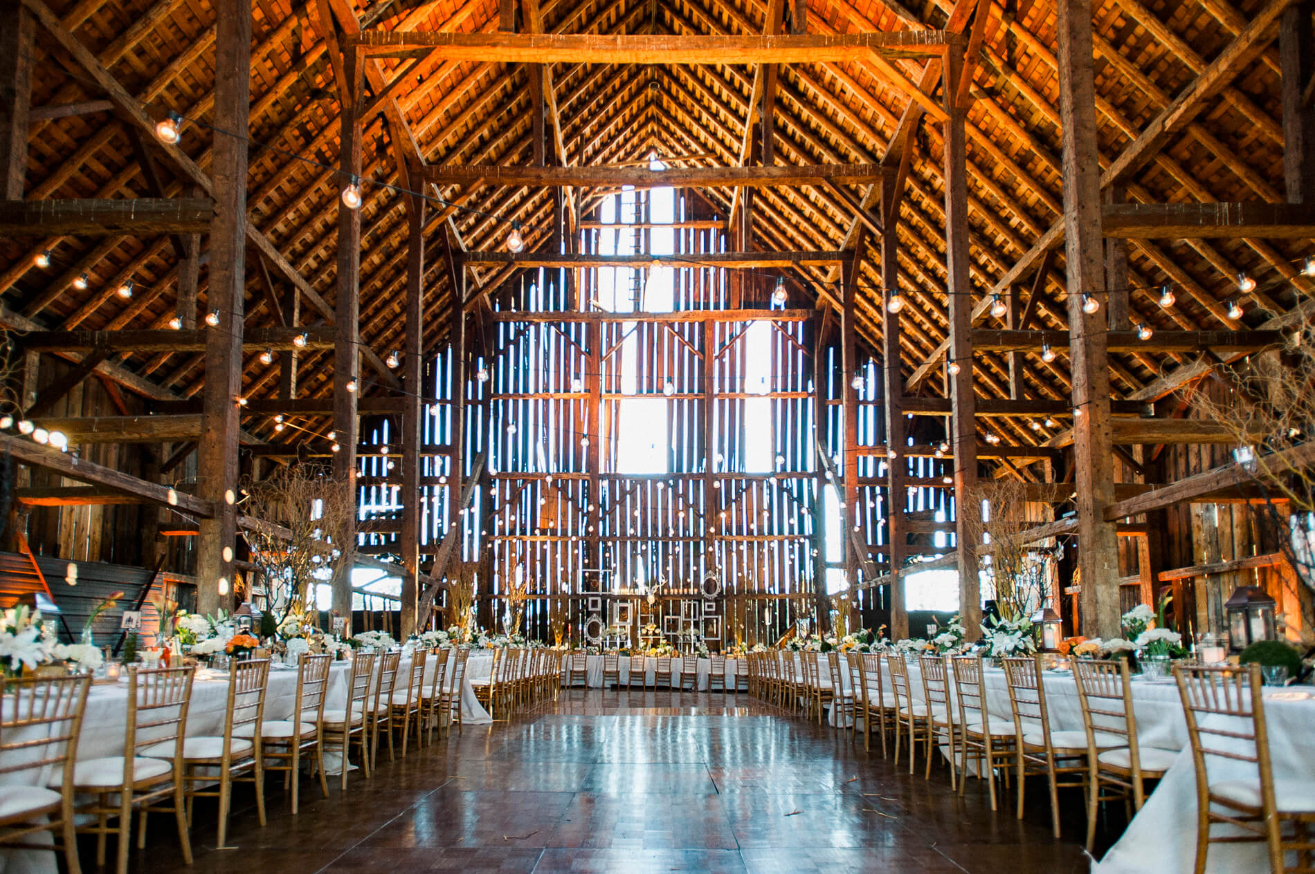 tables and dance floor rustic barn wedding decor lake almanor