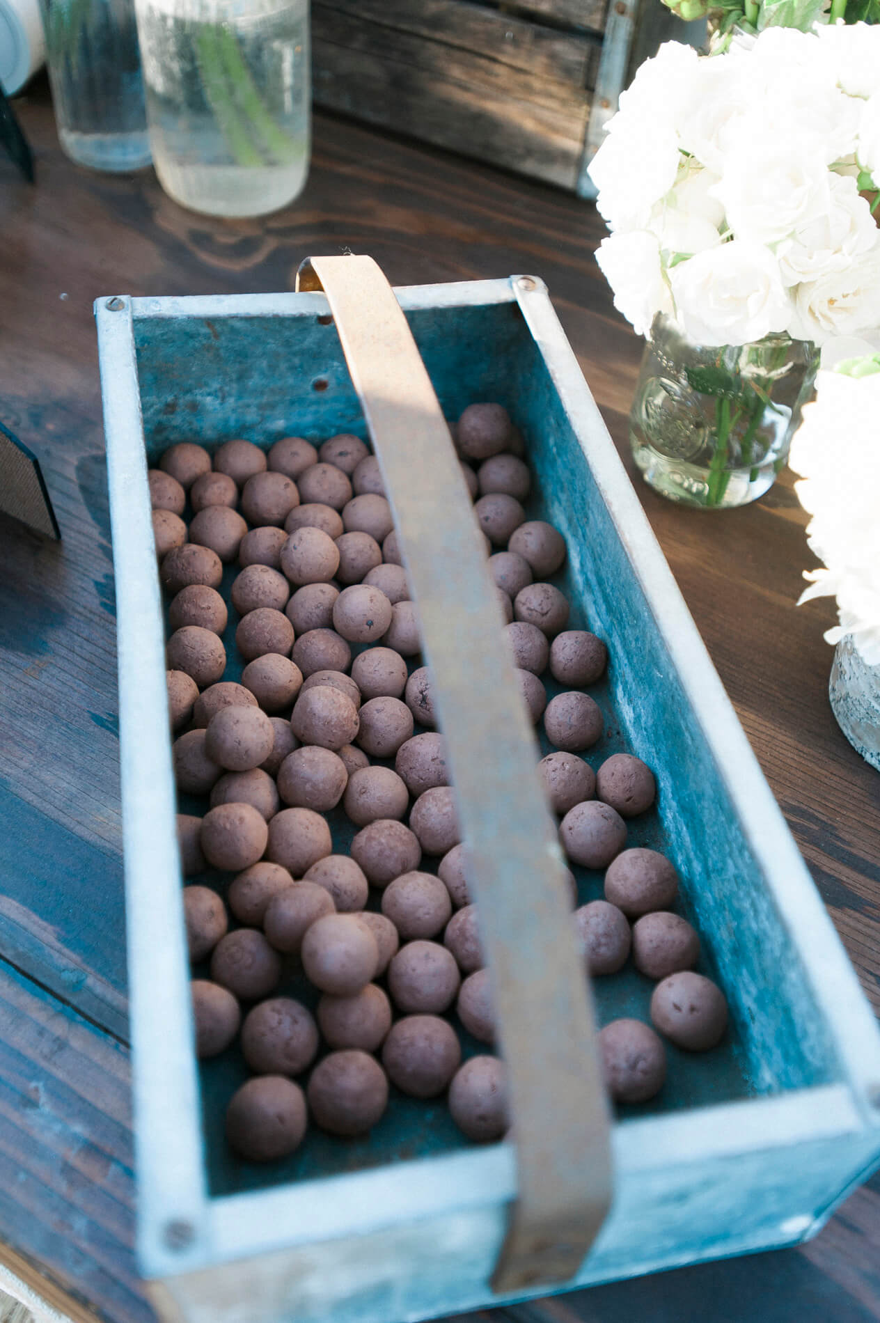 wooden box holding chocolate desserts