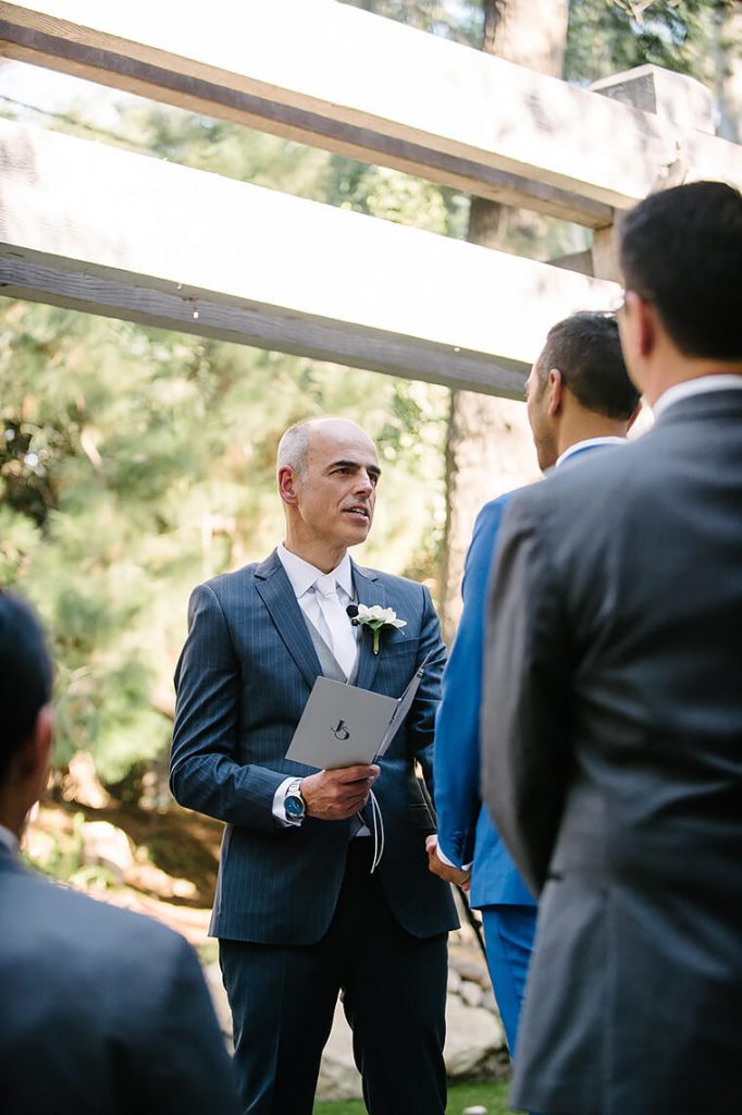 groom reads vows same sex wedding calamigos ranch