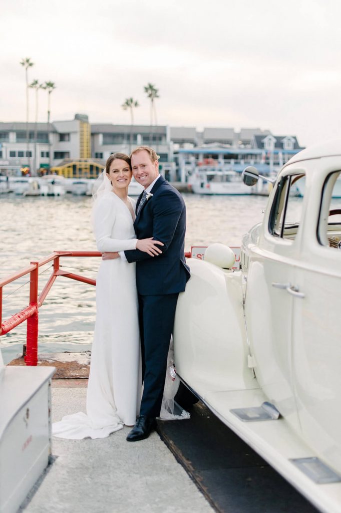 bride and groom with vintage rolls royce balboa island ferry