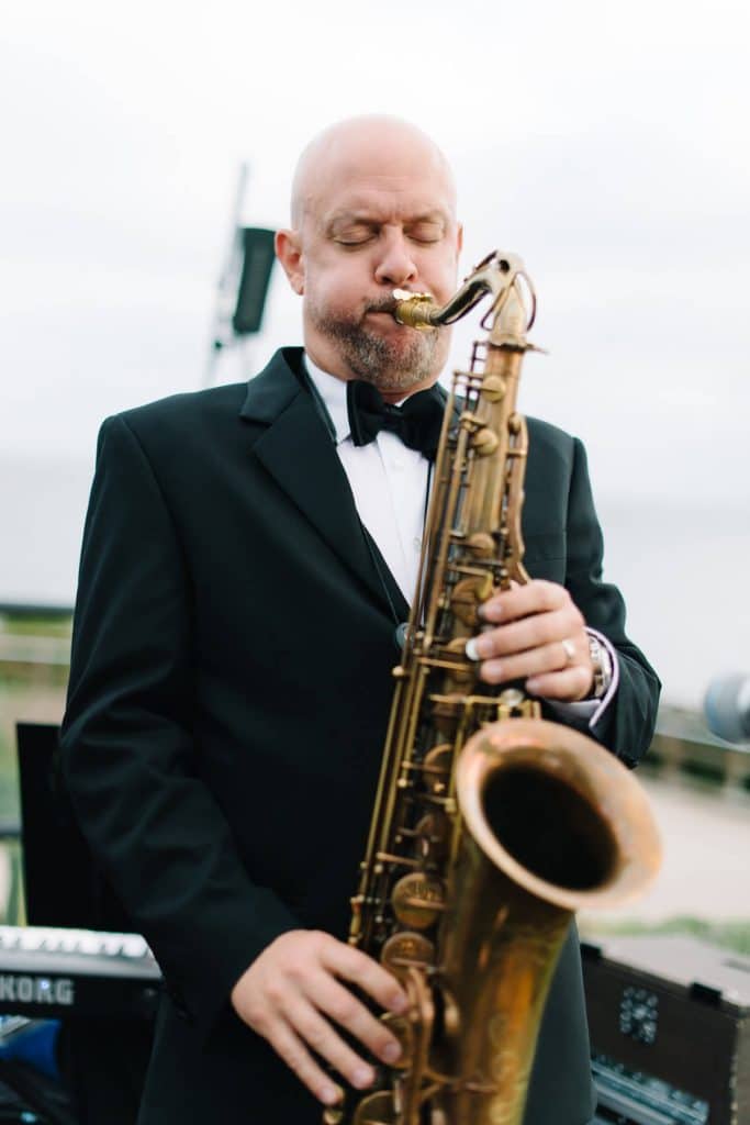 saxophone player montage laguna beach wedding